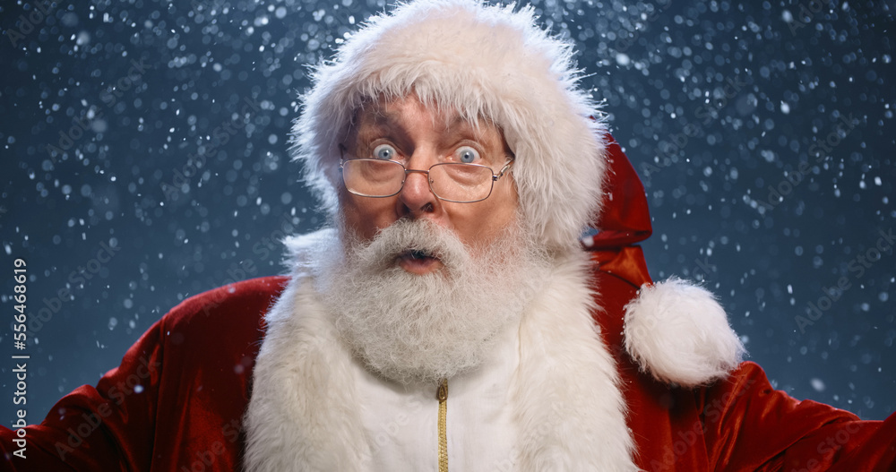 Photo of retired old man grey beard open mouth excited look see magical newyear creature make wish bring atmosphere wear santa costume coat spectacles headwear isolated blue color background Photo of retired old man grey beard open mouth excited look see magical newyear creature make wish bring atmosphere wear santa costume coat spectacles headwear isolated blue color background