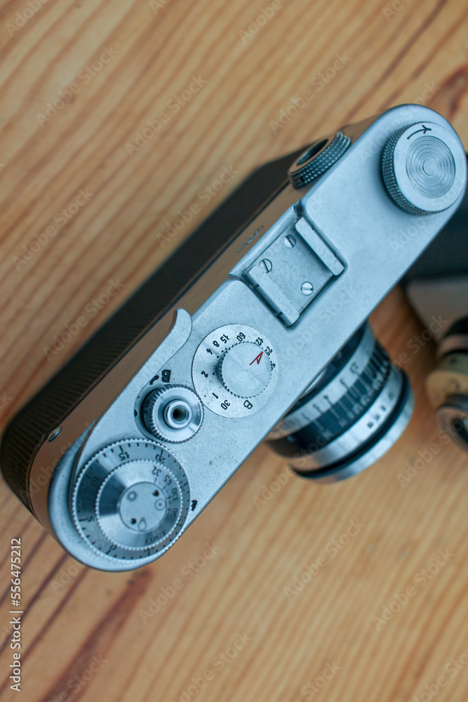 beautiful, old camera on a wooden table