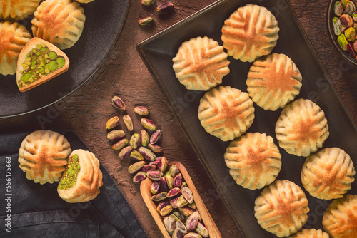 Arabic Cuisine; Middle Eastern traditional "Maamoul or Mamool  Pistachio Cookies" A famous Arabic pastry filled with crushed pistachios. They are served during religious holidays. 