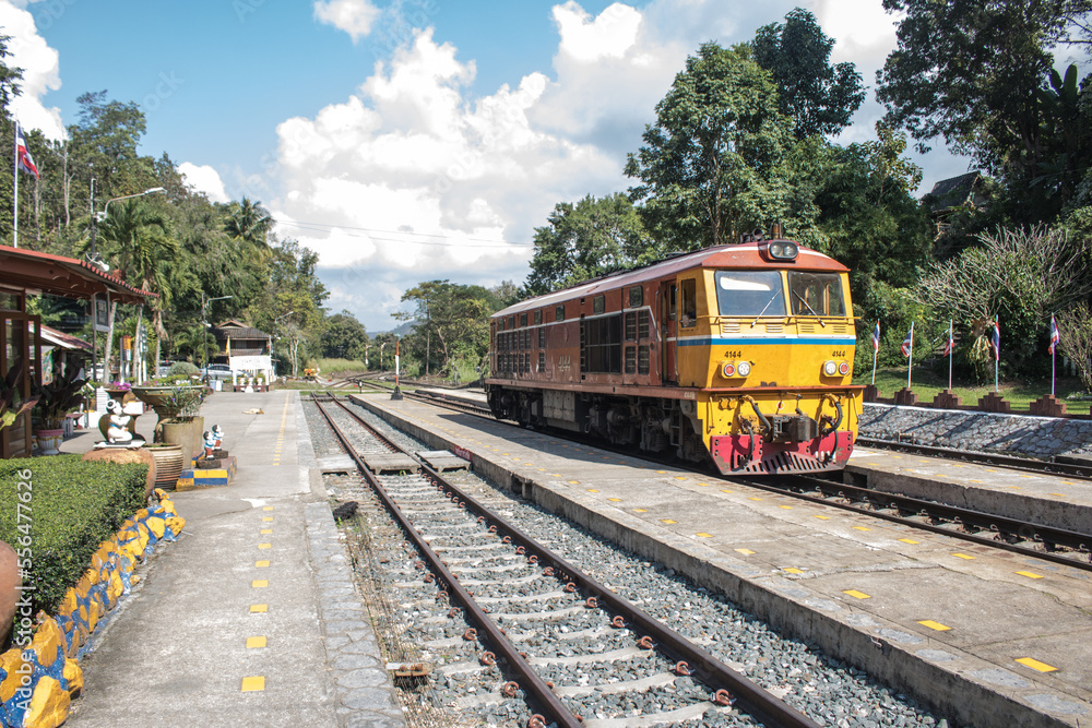 Naklejka premium railway station and train . Railroad with vintage toning