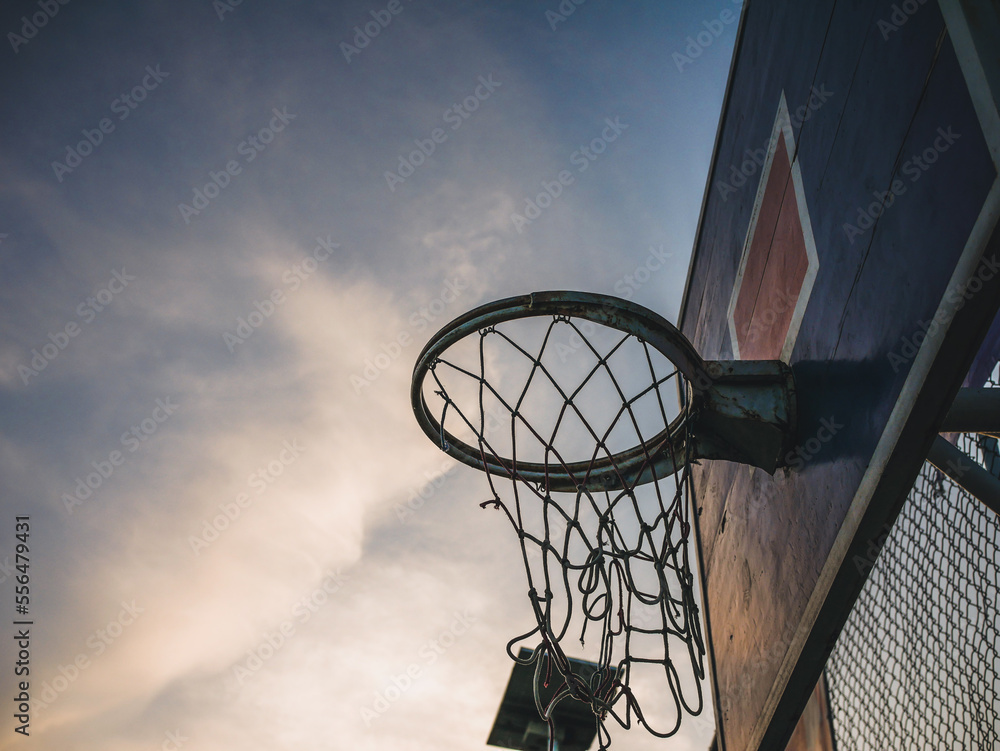 basketball hoop at sunset basketball hoop at sunset