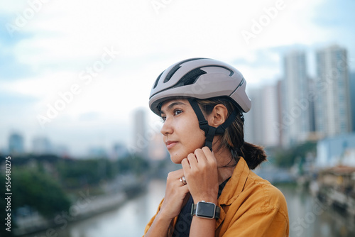 portrait of a young female leisure cyclist.