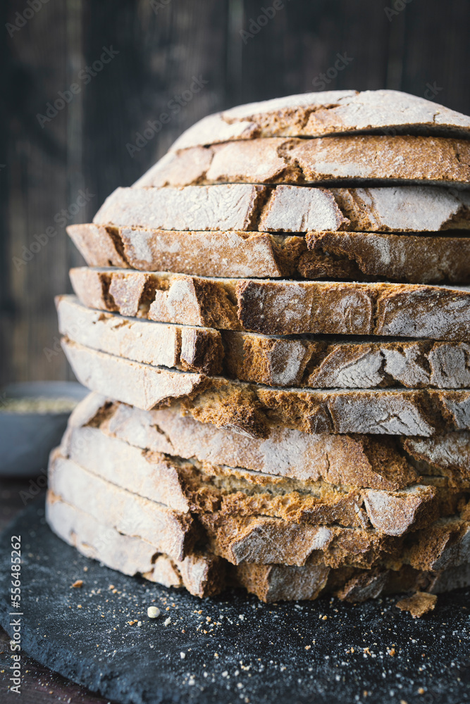 Loaf of wholemeal bread with buckwheat. Buckwheat bread slices Loaf of wholemeal bread with buckwheat. Buckwheat bread slices