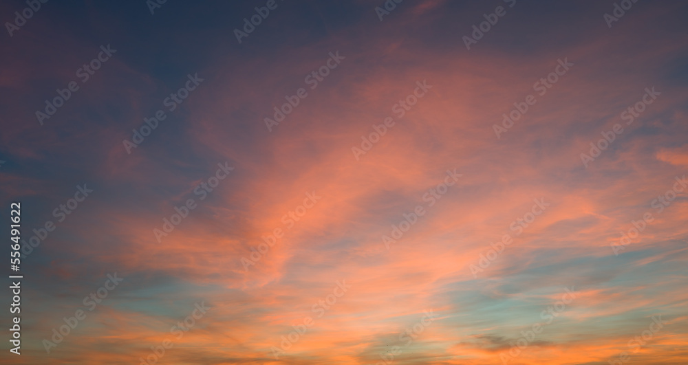 Panorama background of cloudy blue and orange sky, Sky texture