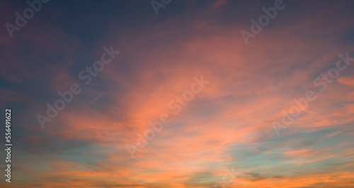 Panorama background of cloudy blue and orange sky, Sky texture