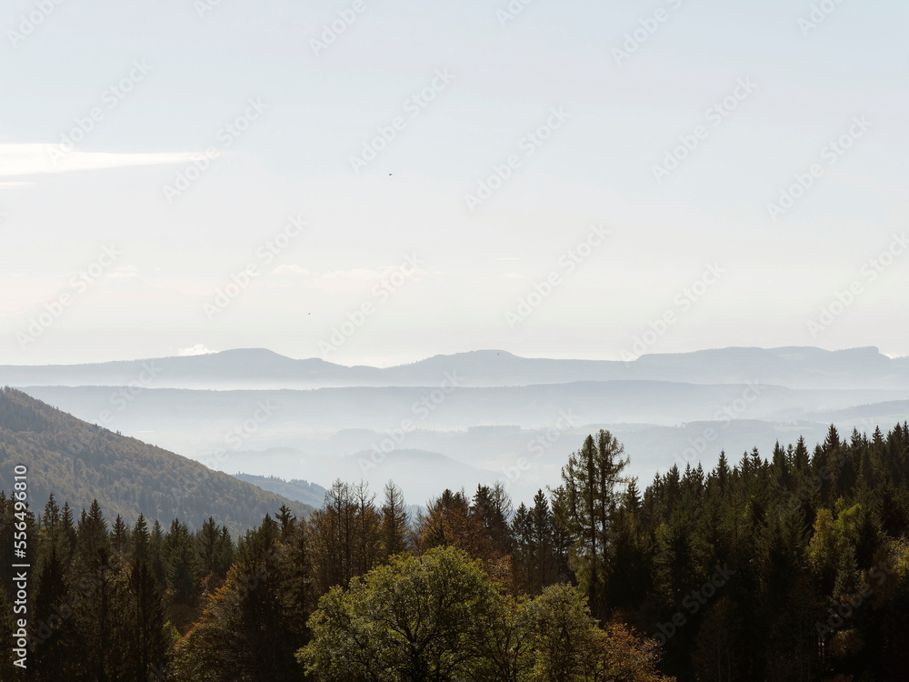 Black Forest landscape around Gersbach in Germany, forested mountains with view of Swiss Jura mountains to horizon
