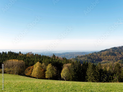 Black Forest landscape around Gersbach in Germany, forested mountains with view of Swiss Jura mountains to horizon
