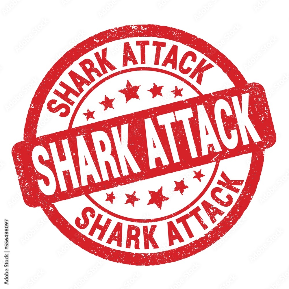SHARK ATTACK text written on red round stamp sign. SHARK ATTACK text written on red round stamp sign.