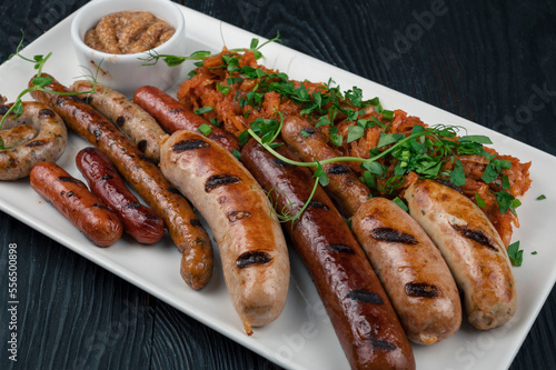 Grilled different sausage w...