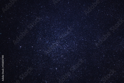 The starry sky. Deep space. A star cluster. A galaxy with a dense star cluster.