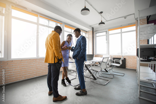 african business people with mobile phones in the office