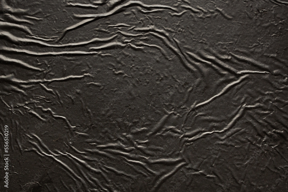 black crumpled and creased plastic bag texture background black crumpled and creased plastic bag texture background
