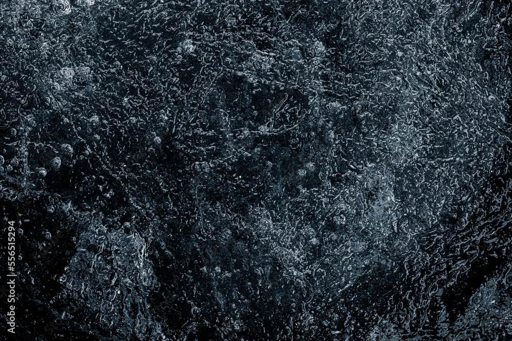Natural textured ice surface black background. Natural textured ice surface black background.
