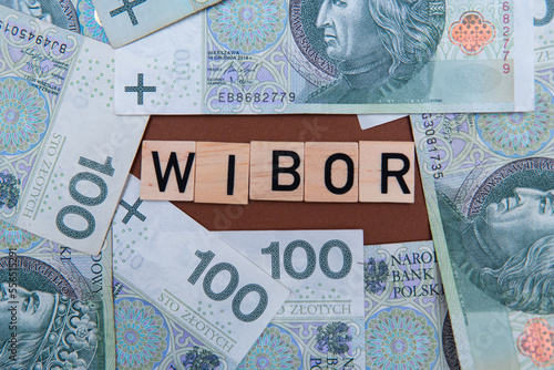 Inscription WIBOR next to polish money. WIBOR is Warsaw Interbank Offered Rate