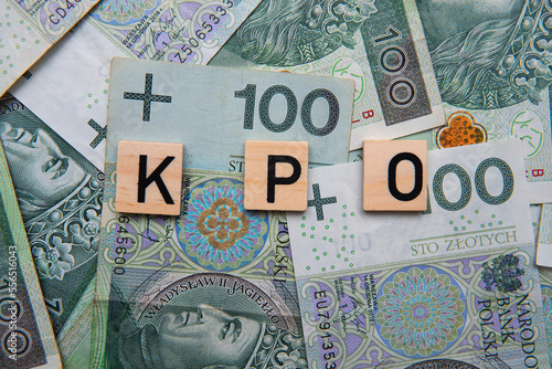 Inscription KPO which is Krajowy Plan Odbudowy next to Polish Money. Concept showing Next Generation EU program for Poland
