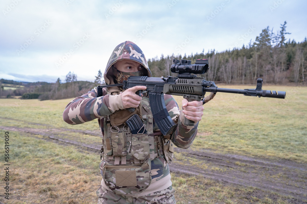 Fototapeta premium Member of the International Legion patrols. The war in Ukraine.Army soldier Patrolled the front line