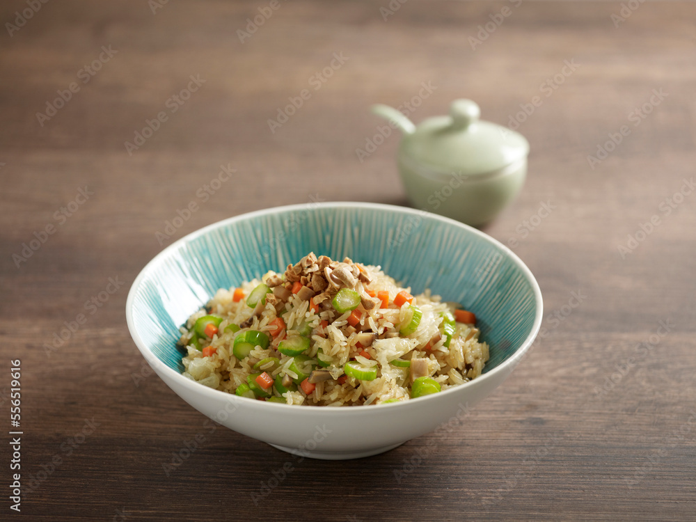Vegetarian Fried Rice served in dish isolated on table top view of food Vegetarian Fried Rice served in dish isolated on table top view of food