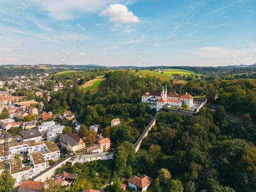 The baroque pilgrimage church Mariahilf with its prominent towers and the adjacent St. Paul monastery, Passau, Germany