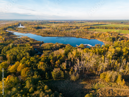 Aerial view of Kremmener See, in the countryside with forest and fields surrounding, Kremmen, Brandenburg