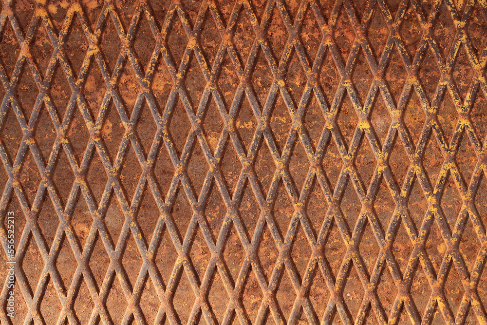 Rusty metal sheet - textured metal background with non slip repetitive pattern Rusty metal sheet - textured metal background with non slip repetitive pattern