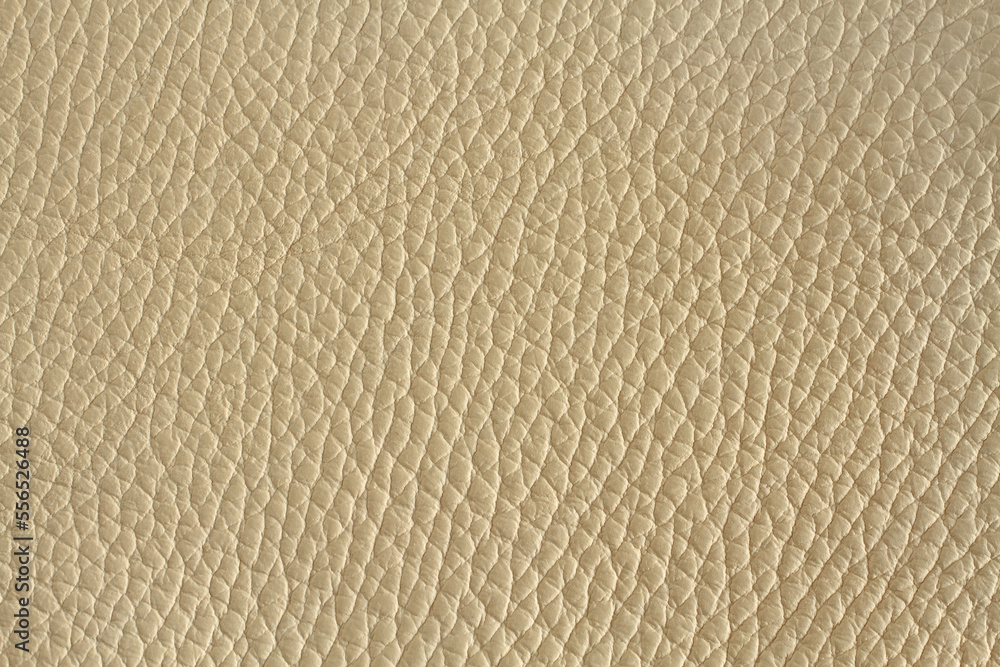 Light beige colored cow leather texture. Closeup Light beige colored cow leather texture. Closeup
