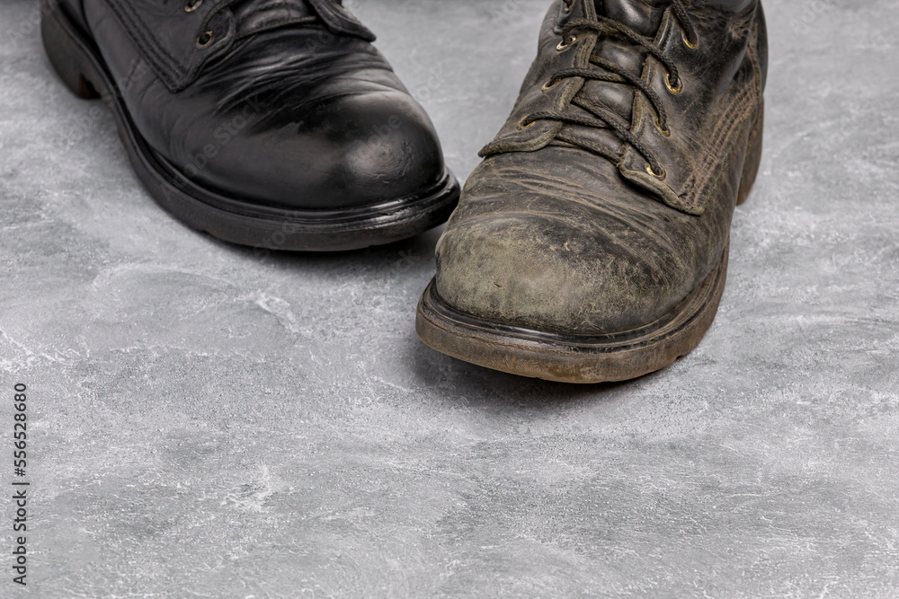 Before and after of polished and dirty leather work boots. Shoe polish, footwear care and cleaning.