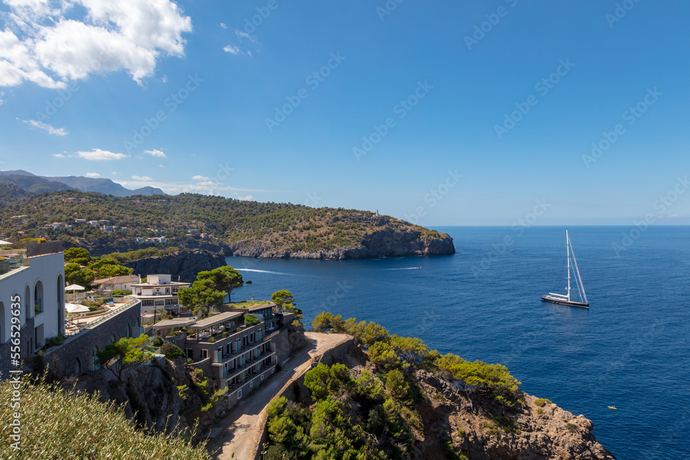 Port de Soller and mountains with sailing ship