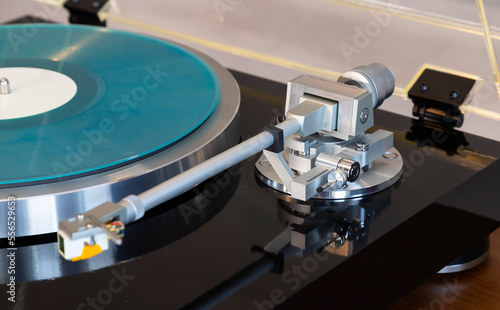 Vintage Stereo Turntable Vinyl Record Tonearm Mechanism Closeup. photo
