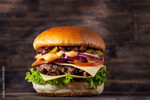 Hamburger on a wooden background photo
