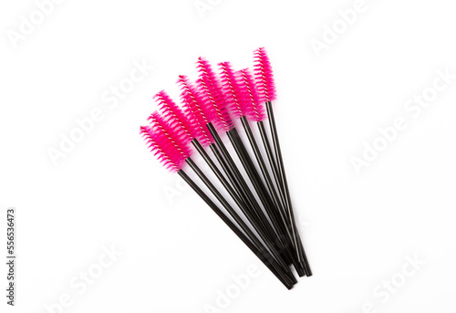 Pink eyelash extension brush isolated on white background. Brush for combing eyelashes.brush for straightening eyelashes and eyebrows.