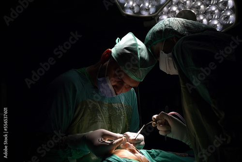rhinoplasty surgery, defects in the shape of the nose in the female patient. Surgical intervention in plastic surgery rhinoplasty 