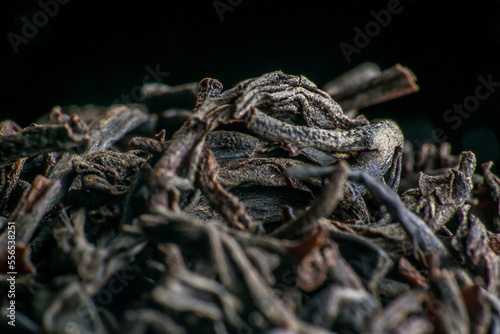 Dried black tea leaves close up. macro photography. Slow motion close-up