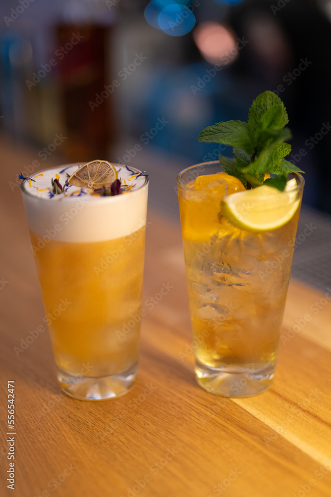 beautiful and delicious alcoholic cocktails prepared at the bar by the bartender. beautiful and delicious alcoholic cocktails prepared at the bar by the bartender.