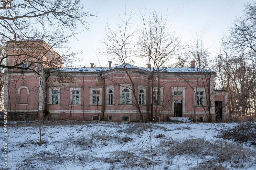 Exterior of an abandoned old historic palace mansion in Poland in Central Europe Exterior of an abandoned old historic palace mansion in Poland in Central Europe