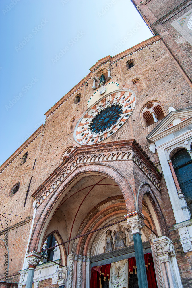 Obraz premium The façade of Lodi Cathedral dedicated to the Virgin of the Assumption built in the 12th century in Romanesque style with belfry and rose window, Lodi city, Lombardy region, Italy