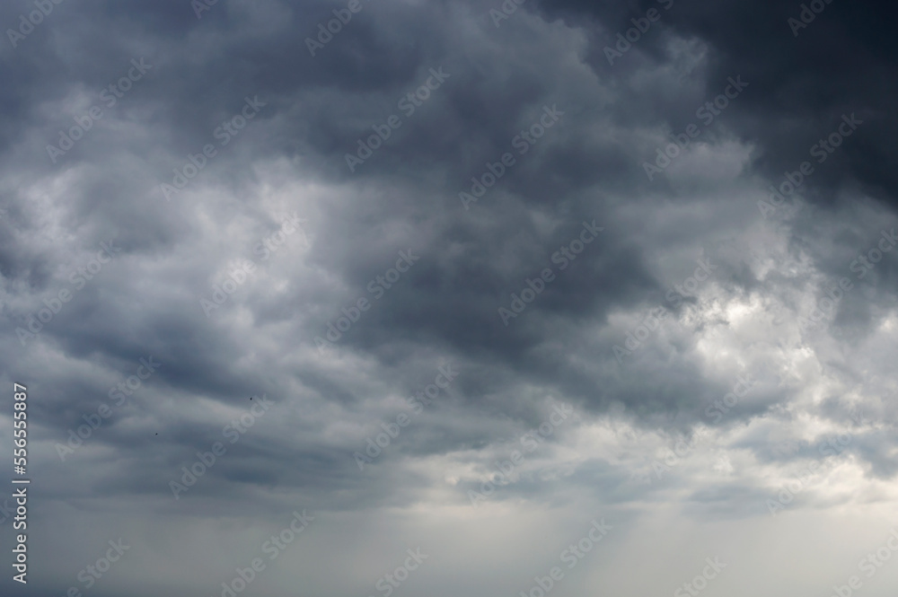 Grey stormy clouds background