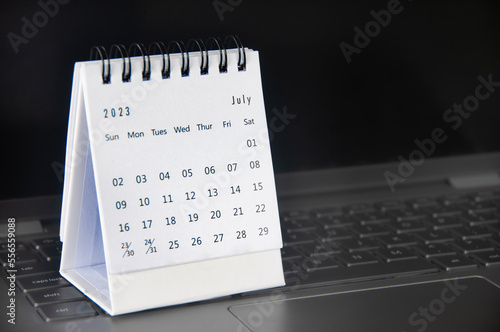 July 2023 table calendar with customizable space for text or ideas. Monthly calendar concept and copy space.
