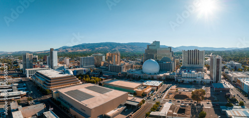 Panoramic aerial view of the city of Reno cityscape in Nevada. Downtown Reno, Nevada, with hotels, casinos and the surrounding High Eastern Sierra foothills. photo