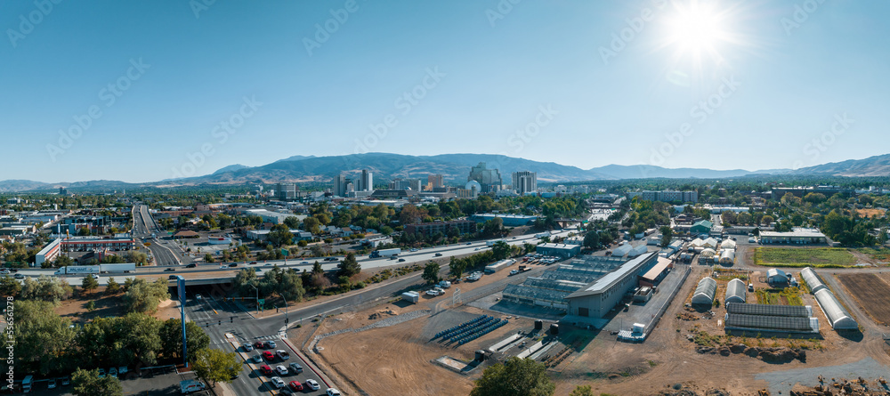 Panoramic aerial view of the city of Reno cityscape in Nevada. Downtown Reno, Nevada, with hotels, casinos and the surrounding High Eastern Sierra foothills.
