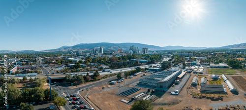 Fototapeta Naklejka Na Ścianę i Meble -  Panoramic aerial view of the city of Reno cityscape in Nevada. Downtown Reno, Nevada, with hotels, casinos and the surrounding High Eastern Sierra foothills.