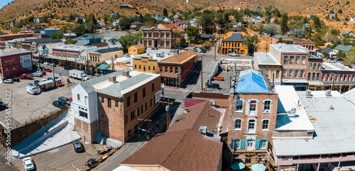 Aerial scenic view of Victorian building on historic Main C street in downtown Virginia City. Cars parked along the street of Virginia, Nevada, USA