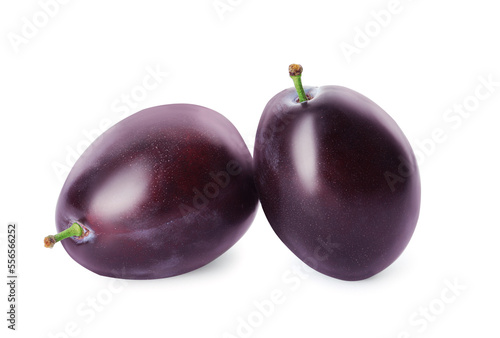 Delicious fresh ripe plums on white background
