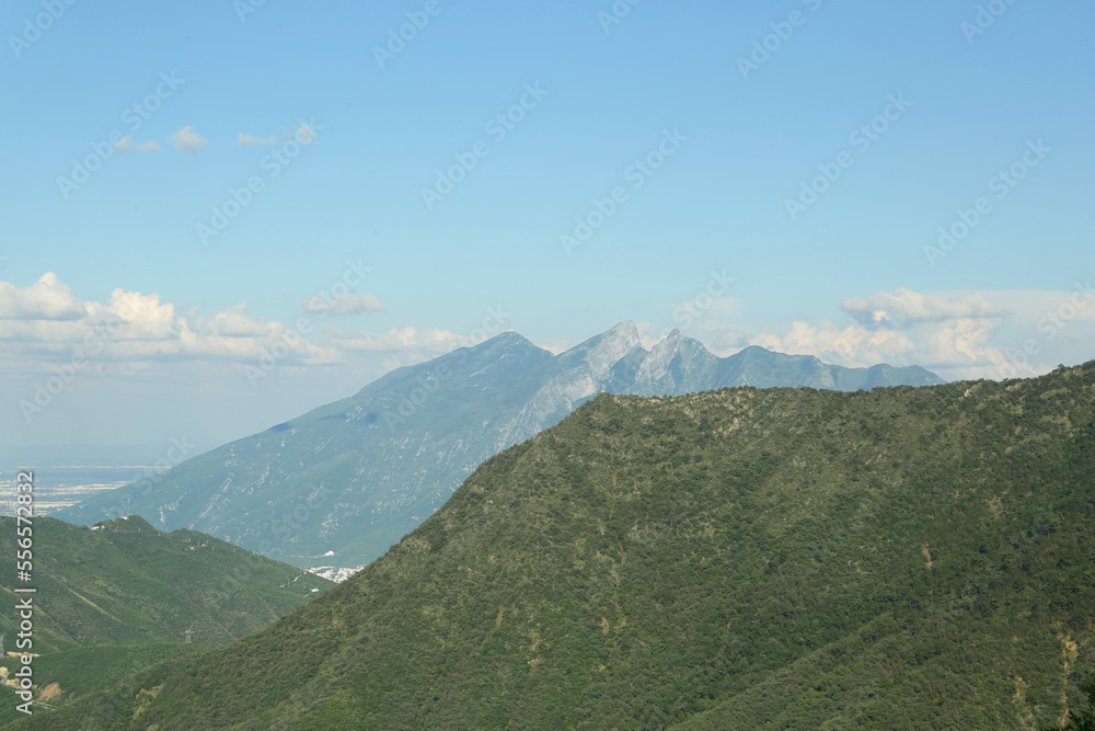 Picturesque view of big mountains under blue sky on sunny day
