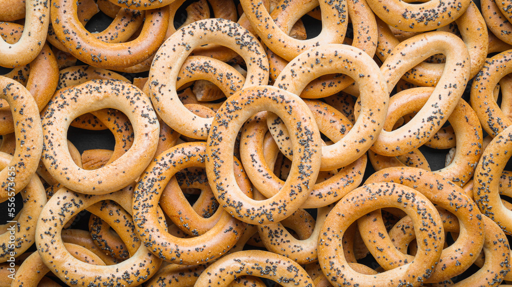 Many delicious ring shaped Sushki (dry bagels) as background, top view Many delicious ring shaped Sushki (dry bagels) as background, top view