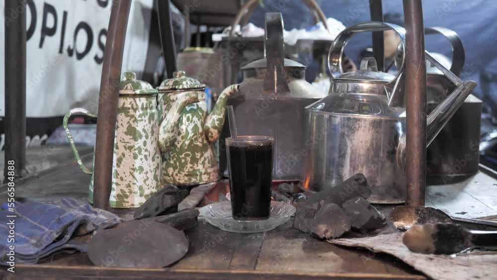 Kopi Jos is one of the signature drinks at Angkringan in Yogyakarta. charcoal. Kopi Jos is one of the signature drinks at Angkringan in Yogyakarta. charcoal.