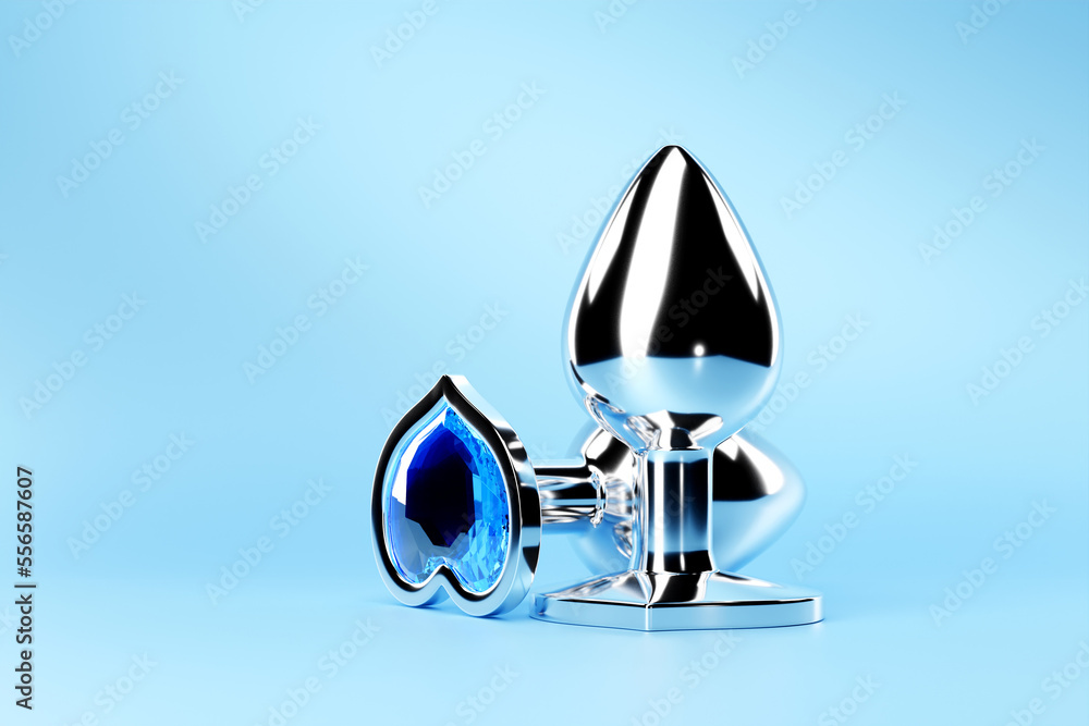 Fototapeta premium 3D illustration. Silver butt anal plugs sex toys on blue background.
