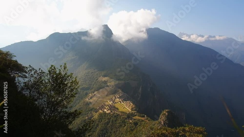 Machu Picchu Sacred Inca Ruins, Peru, Sunny Valley, Aerial Drone Shot, Daylight over Latin American Indigenous Temple photo