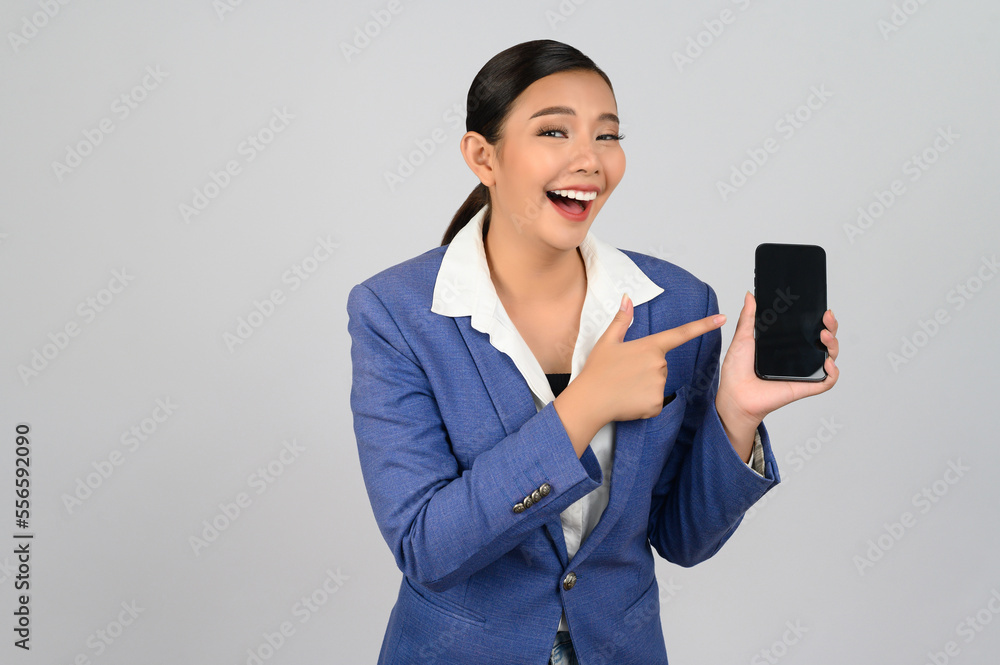 Young beautiful woman in formal clothing for officer use smartphone posture Young beautiful woman in formal clothing for officer use smartphone posture