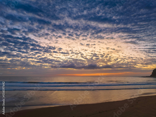 Fototapeta Naklejka Na Ścianę i Meble -  Beautiful sunrise with clouds over the ocean