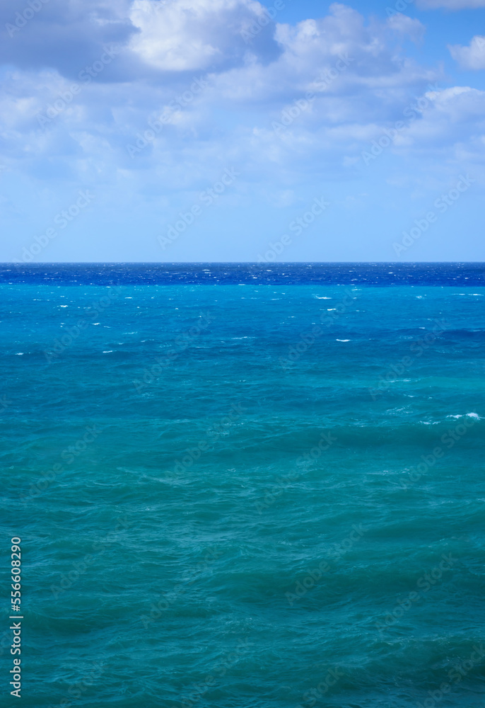 View of the dark blue sea in Greece and the sky with clouds View of the dark blue sea in Greece and the sky with clouds